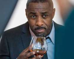 Idris Elba consuming alcohol